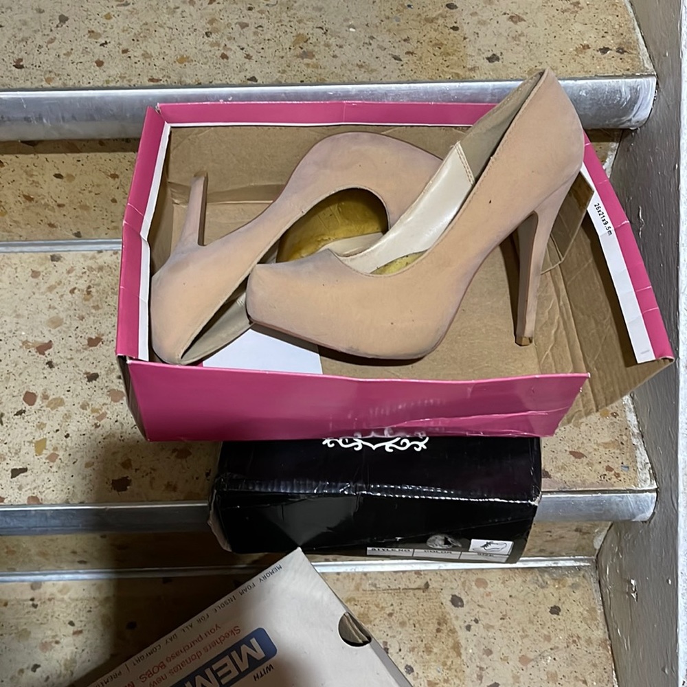 Used neutral color heels